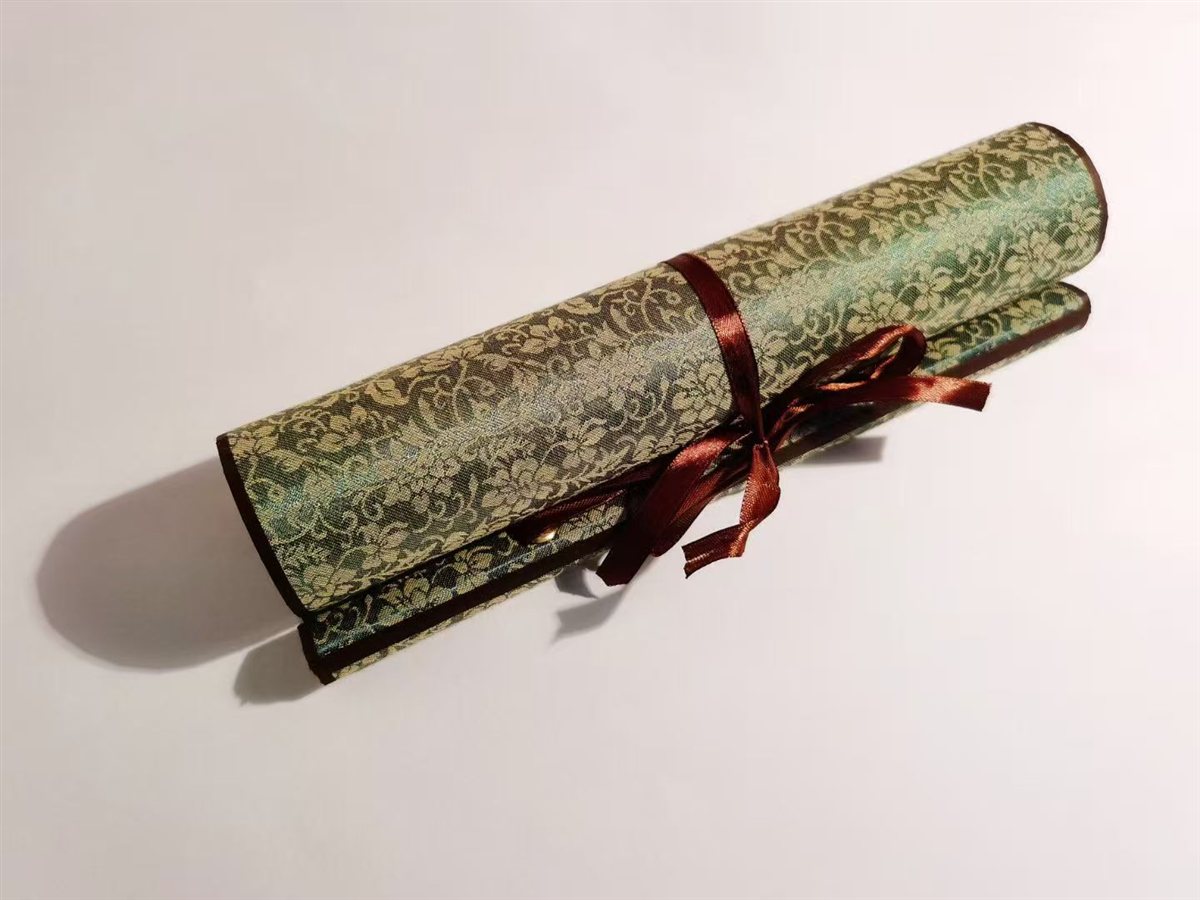 Brocade scroll-book — rolled